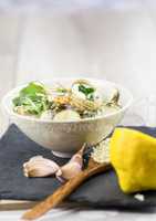 Bowl of delicious seafood ragout with coriander