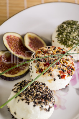 Delicious appetizer of goats milk cheese and figs