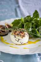 Delicious appetizer of goats milk cheese and figs