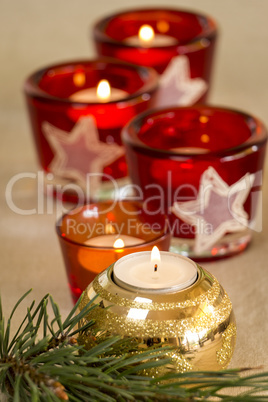 Christmas background with a golden candle