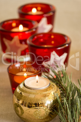 Christmas background with a golden candle