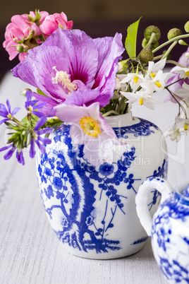 Fresh summer flowers in a ginger jar