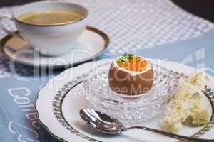 Boiled egg with caviar for breakfast