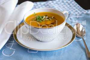 Garnished pumpkin Soup in Tea Cup