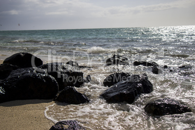 Storm clouds gathering over a tranquil beach