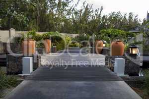 Pond and walkway in a formal garden