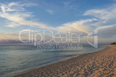 Colorful tropical sunset over a calm ocean