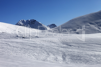 Ski slope at nice sunny morning