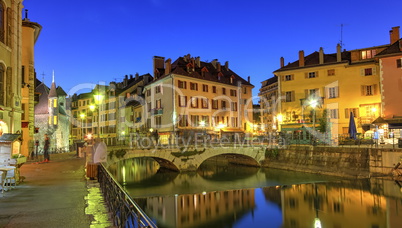 Palais de l'Ile jail, Perriere bridge and canal in Annecy old city, France, HDR