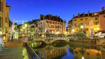 Palais de l'Ile jail, Perriere bridge and canal in Annecy old city, France, HDR