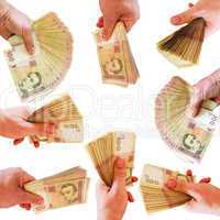 hands offering Ukrainian money isolated