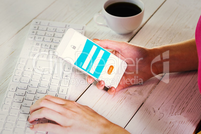 Composite image of woman using smartphone at work