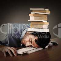 Composite image of businessman sleeping with his head on the key