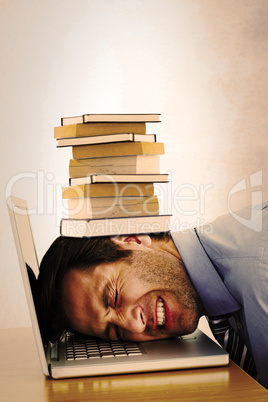 Composite image of businessman resting head on keyboard