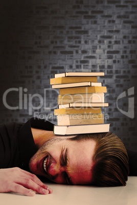 Composite image of stressed businessman banging his head
