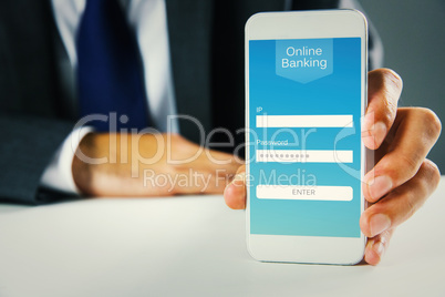 Composite image of businessman using smartphone