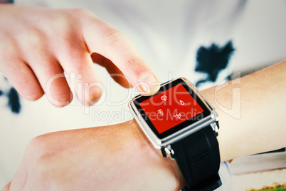 Composite image of woman using smartwatch