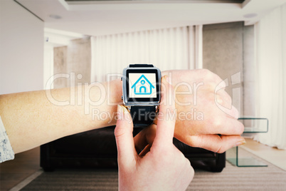 Composite image of woman using smartwatch