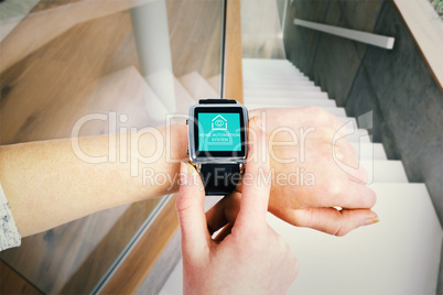 Composite image of woman using smartwatch