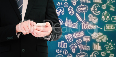 Composite image of businessman sending a text message