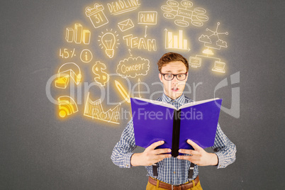 Composite image of geeky businessman reading a book