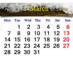 Calendar for March 2016 with a layer of snow on the tree