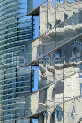 Reflection in windows of modern office building