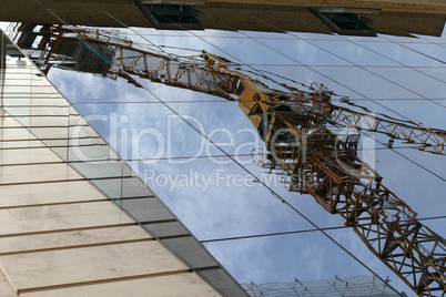 Reflection in windows of modern office building