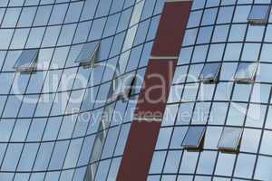 Reflection in windows of modern office building