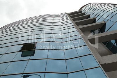 Reflection in windows of modern office building