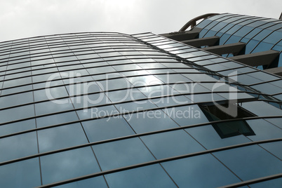 Reflection in windows of modern office building