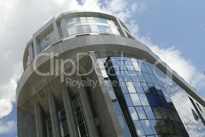 Reflection in windows of modern office building