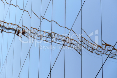 Reflection in windows of modern office building