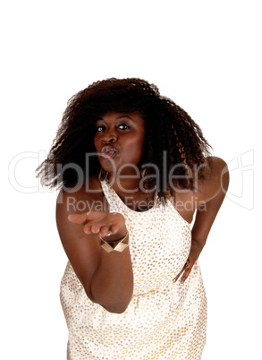 African woman blowing kiss.