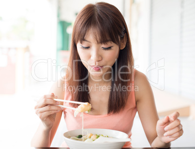 Eating noodles