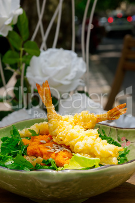 fresh Japanese tempura shrimps with salad