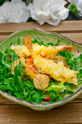 fresh Japanese tempura shrimps with salad