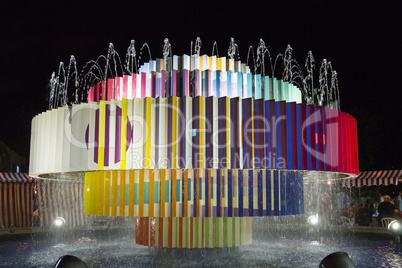 Colorful fountain at Dizengoff square in Tel Aviv .