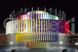 Colorful fountain at Dizengoff square in Tel Aviv .