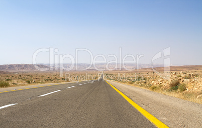 Beautiful road in the desert .