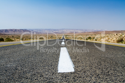 Beautiful road in the desert .