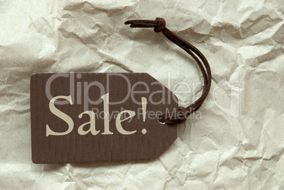 Brown Label With Sale Paper Background