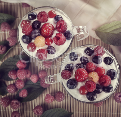 Two Cups Of Yogurt With Berries