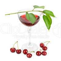 cherry and glass of juice isolated on white background