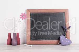 Empty chalkboard with a heart shape