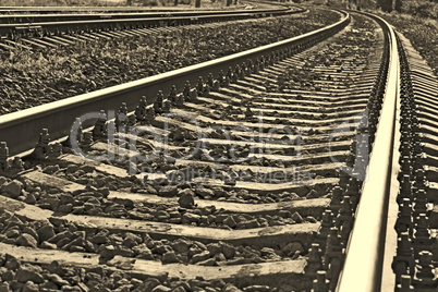 Railroad track into sepia