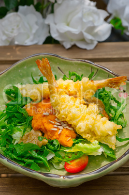 fresh Japanese tempura shrimps with salad