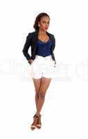 African woman in white shorts.