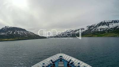 The Ship sails into the fjord