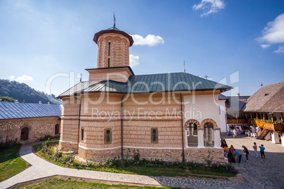 Tourists visiting the old orthodox monastery from Polovragi